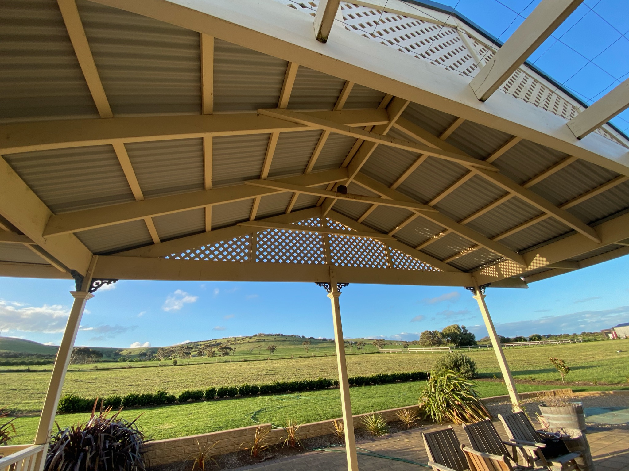 Timber pergola creating a warm and inviting outdoor living area